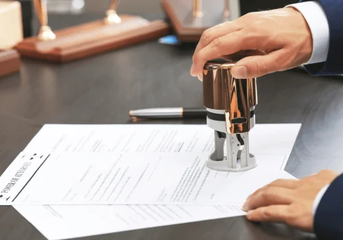 Legal certification process with a professional stamp, reflecting the security of Online Minor Travel Authorizations.